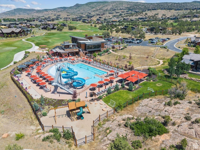 3057 E Corral Peak Cir Unit 147, Heber City, UT 84032 - aerial perspective of suburban area featuring a mountain backdrop and a golf club