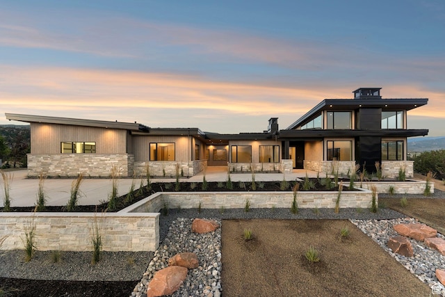 3057 E Corral Peak Cir Unit 147, Heber City, UT 84032 - back of house featuring stone siding