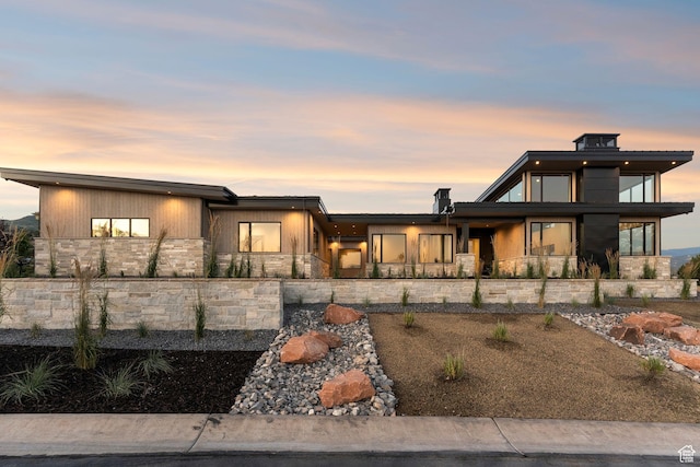 3057 E Corral Peak Cir Unit 147, Heber City, UT 84032 - view of front of property featuring stone siding and covered porch