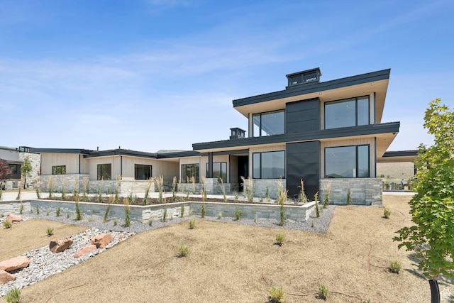 3057 E Corral Peak Cir Unit 147, Heber City, UT 84032 - rear view of property featuring stone siding