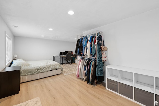 4913 W Olympic View Dr S, Kearns, UT 84118 - bedroom featuring wood finished floors, recessed lighting, and a desk