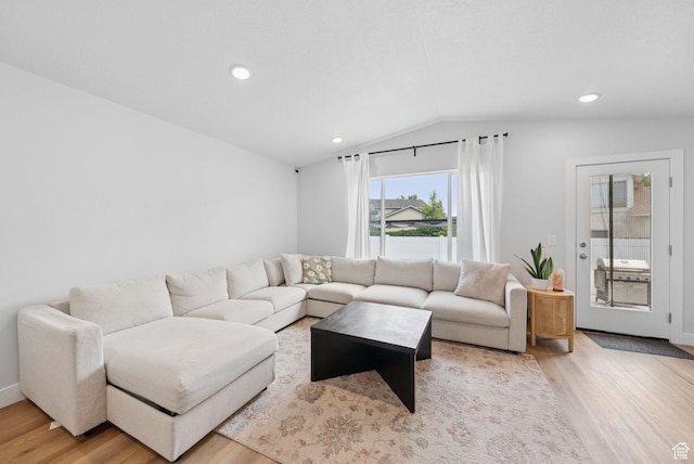 4913 W Olympic View Dr S, Kearns, UT 84118 - living area with light wood-type flooring, lofted ceiling, and recessed lighting