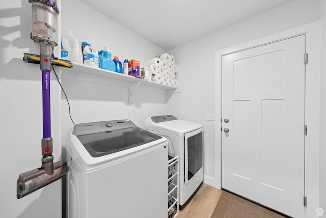 4913 W Olympic View Dr S, Kearns, UT 84118 - laundry area featuring washer and clothes dryer and light wood-type flooring
