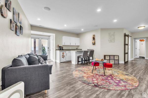 2330 E Meadow Lark Ln, North Logan, UT 84341 - living room with wood finished floors and recessed lighting