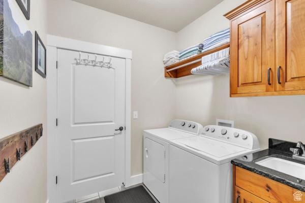 2330 E Meadow Lark Ln, North Logan, UT 84341 - laundry area with washer and dryer and cabinet space