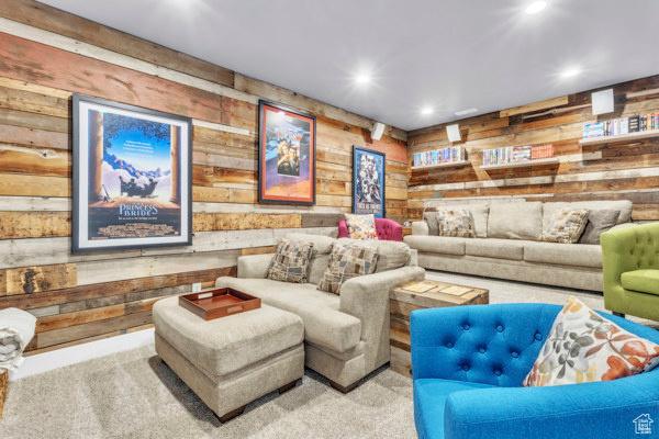 2330 E Meadow Lark Ln, North Logan, UT 84341 - carpeted living room featuring wooden walls and recessed lighting