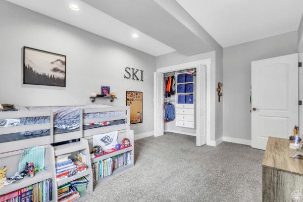2330 E Meadow Lark Ln, North Logan, UT 84341 - carpeted bedroom with recessed lighting and a closet