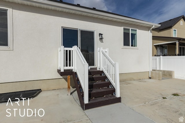 3643 W 650 N, Layton, UT 84041 - view of exterior entry featuring stucco siding and a patio