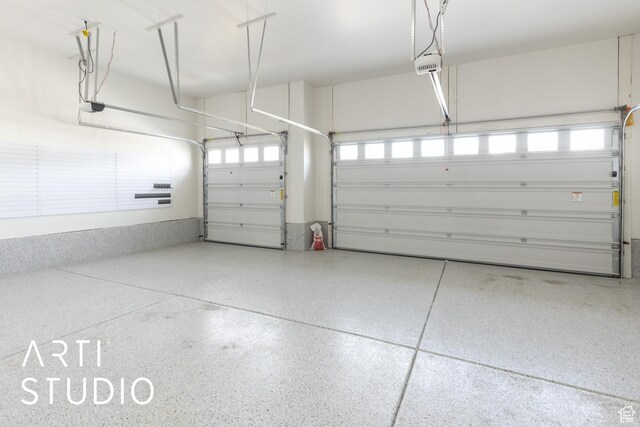 3643 W 650 N, Layton, UT 84041 - garage featuring a garage door opener