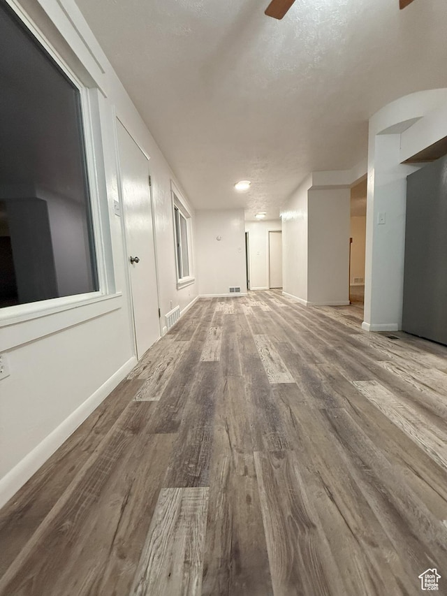 318 E 100 N, Brigham City, UT 84302 - empty room with ceiling fan and wood finished floors