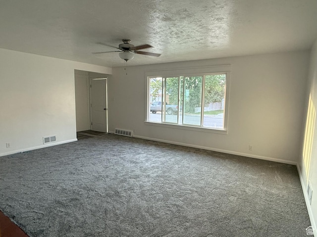 318 E 100 N, Brigham City, UT 84302 - unfurnished room featuring ceiling fan and dark carpet