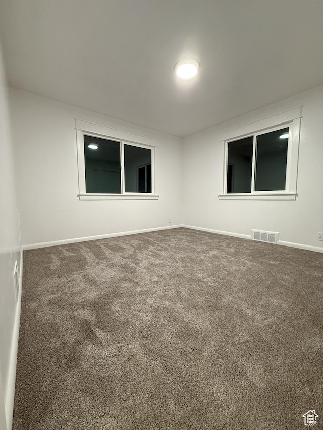 318 E 100 N, Brigham City, UT 84302 - carpeted spare room with baseboards