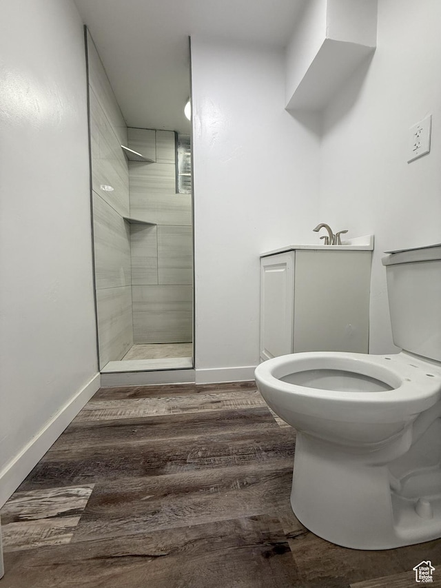 318 E 100 N, Brigham City, UT 84302 - bathroom with a tile shower and wood finished floors