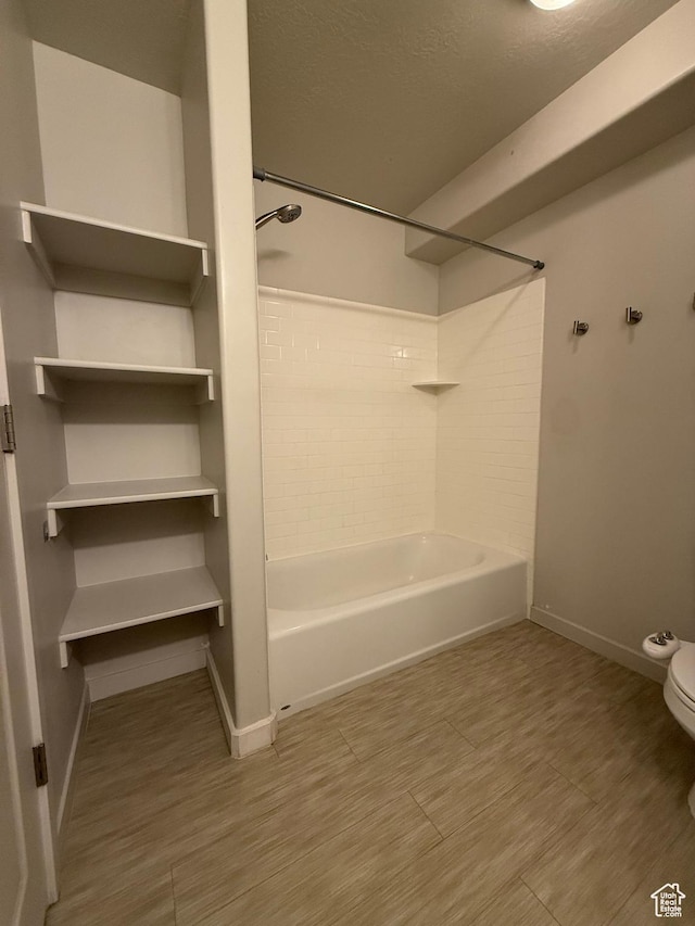 1055 W 1033 N Unit 301, Orem, UT 84057 - bathroom featuring washtub / shower combination and a textured ceiling