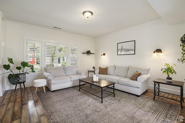 10907 Tahoe Way S, Jordan, UT 84009 - living area featuring wood-type flooring and baseboards