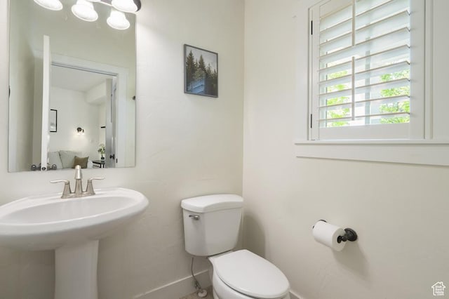 10907 Tahoe Way S, Jordan, UT 84009 - half bathroom with toilet and a sink