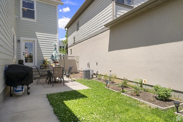 10907 Tahoe Way S, Jordan, UT 84009 - view of yard with a patio and a vegetable garden