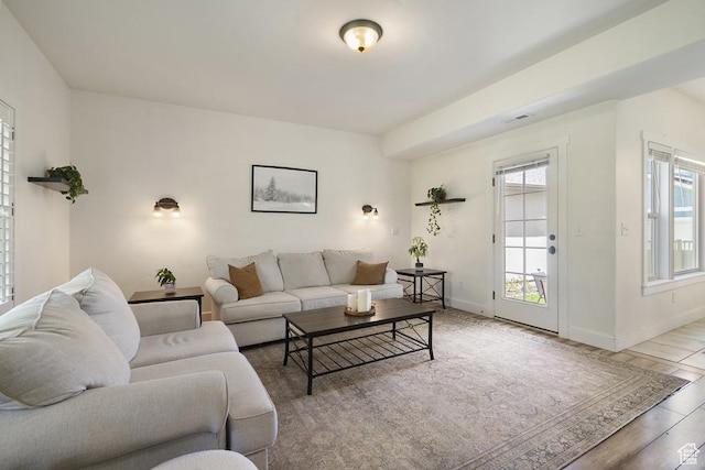 10907 Tahoe Way S, Jordan, UT 84009 - living area with wood finished floors and baseboards