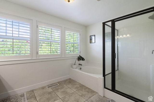 10907 Tahoe Way S, Jordan, UT 84009 - full bath featuring a bath, tile patterned floors, and a stall shower