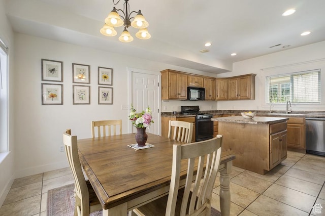 10907 Tahoe Way S, Jordan, UT 84009 - dining space featuring light tile patterned floors, a chandelier, and recessed lighting