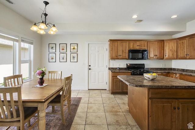 10907 Tahoe Way S, Jordan, UT 84009 - kitchen with black appliances, brown cabinets, dark countertops, a chandelier, and light tile patterned floors