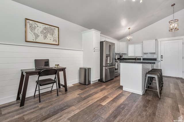 247 S 700 E Unit 54, Salt Lake City, UT 84102 - kitchen with appliances with stainless steel finishes, a chandelier, white cabinetry, and lofted ceiling