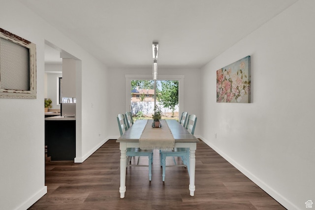 1888 W 7265 S, West Jordan, UT 84084 - dining space featuring dark wood-style floors and baseboards