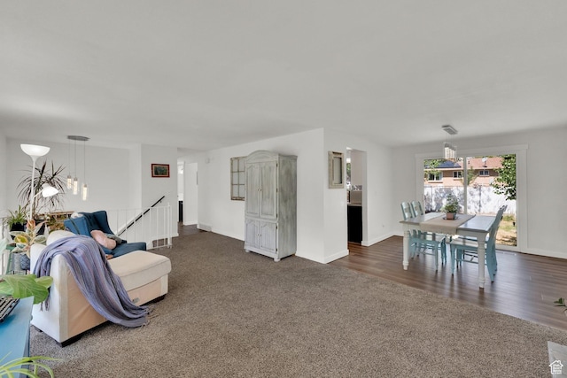 1888 W 7265 S, West Jordan, UT 84084 - living room with a chandelier and dark carpet
