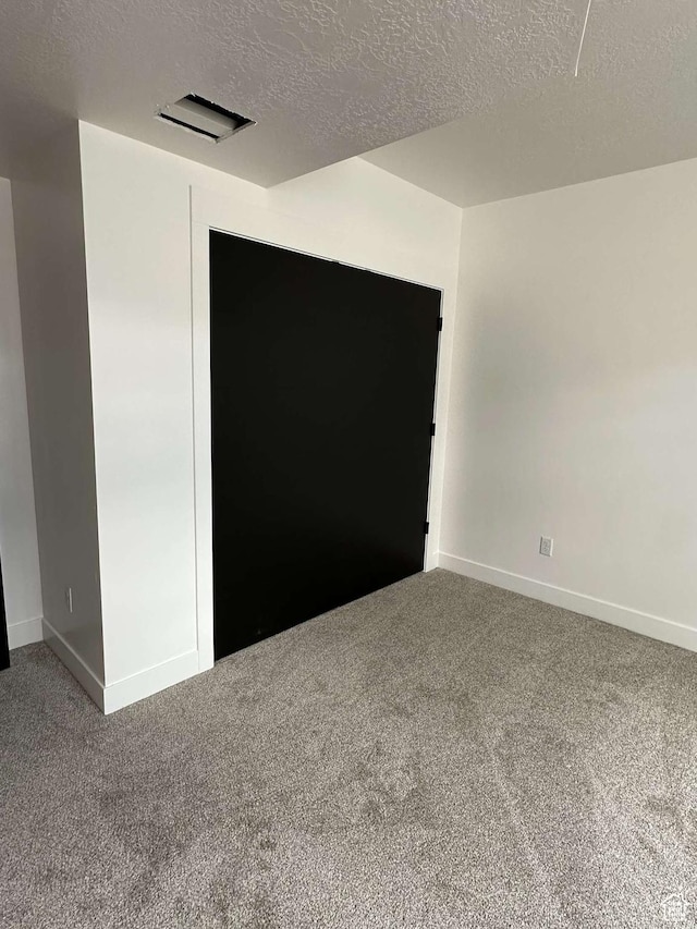 420 W 350 N, Gunnison, UT 84634 - spare room featuring a textured ceiling and carpet flooring
