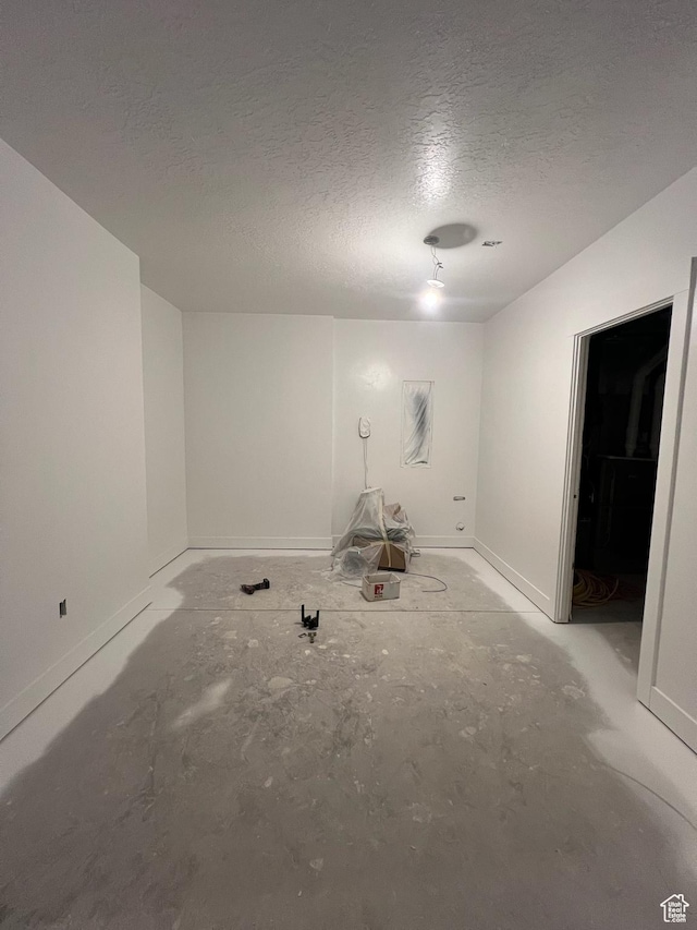 420 W 350 N, Gunnison, UT 84634 - unfurnished room with a textured ceiling and baseboards
