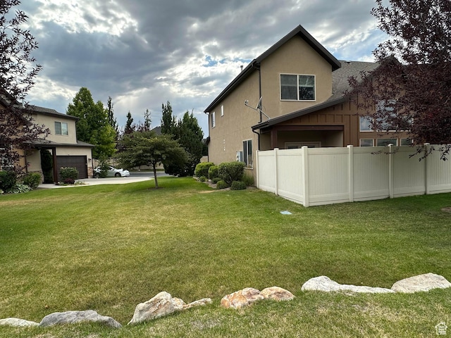 10227 Mystic Brook Way S, South Jordan, UT 84095 - view of yard with a garage