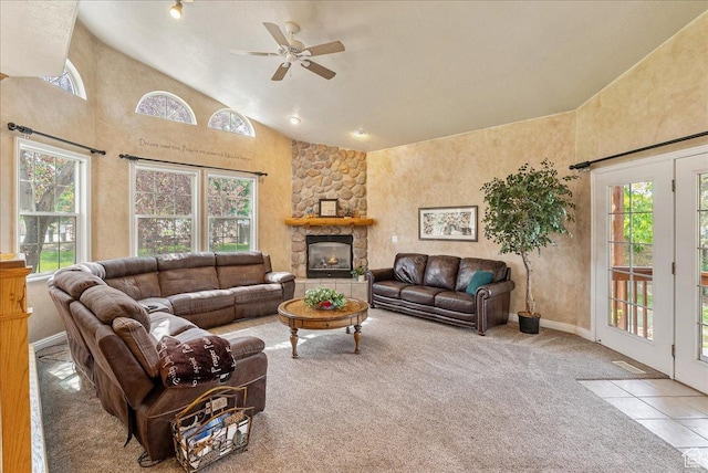 2602 W 11625 S, Riverton, UT 84095 - living area featuring plenty of natural light, a ceiling fan, high vaulted ceiling, a fireplace, and carpet flooring
