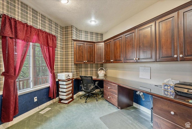 2602 W 11625 S, Riverton, UT 84095 - office featuring built in desk, carpet flooring, wallpapered walls, and a textured ceiling