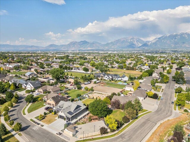 2602 W 11625 S, Riverton, UT 84095 - aerial view of residential area featuring a mountainous background