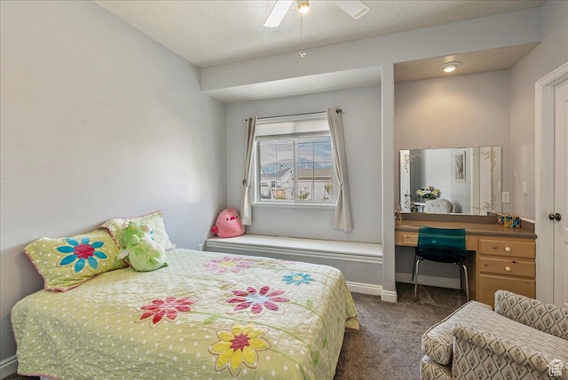 2602 W 11625 S, Riverton, UT 84095 - bedroom with dark carpet, a desk, and ceiling fan
