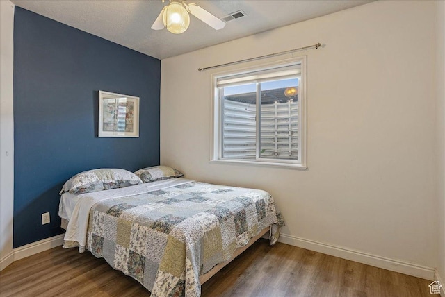 2602 W 11625 S, Riverton, UT 84095 - bedroom with wood finished floors and a ceiling fan