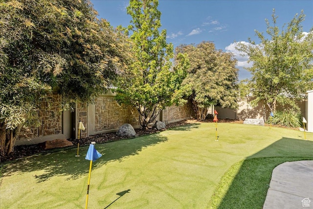 2602 W 11625 S, Riverton, UT 84095 - fenced backyard with a putting area
