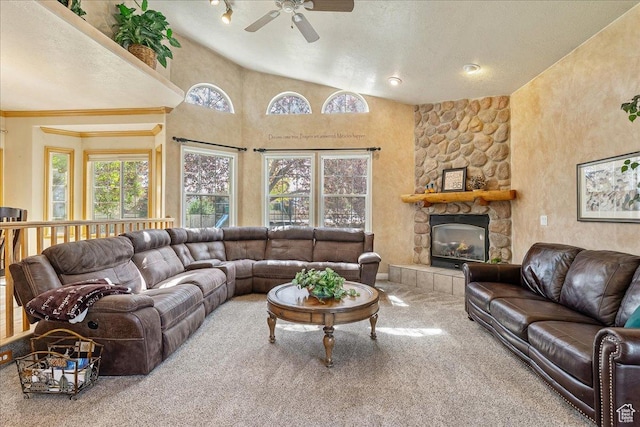 2602 W 11625 S, Riverton, UT 84095 - carpeted living area with a ceiling fan, lofted ceiling, and a large fireplace