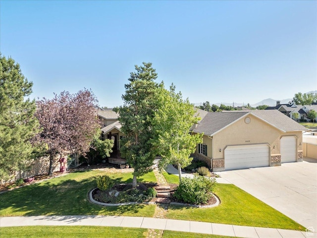 2602 W 11625 S, Riverton, UT 84095 - view of front of house with stucco siding, an attached garage, a front lawn, driveway, and roof with shingles