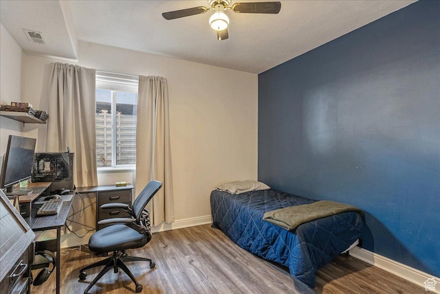 2602 W 11625 S, Riverton, UT 84095 - bedroom featuring wood finished floors, a desk, and ceiling fan