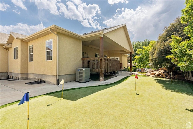 2602 W 11625 S, Riverton, UT 84095 - view of property exterior featuring a putting area, a patio, and stucco siding