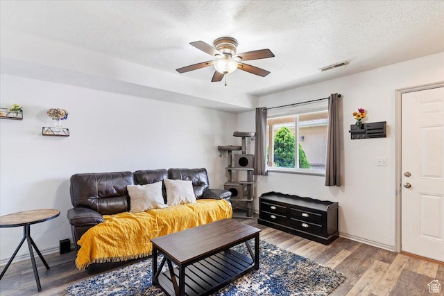 228 W 1975 N Unit 56, Harrisville, UT 84414 - living area featuring ceiling fan, light wood-style flooring, and a textured ceiling