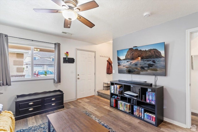 228 W 1975 N Unit 56, Harrisville, UT 84414 - living room featuring wood finished floors, a ceiling fan, and a textured ceiling
