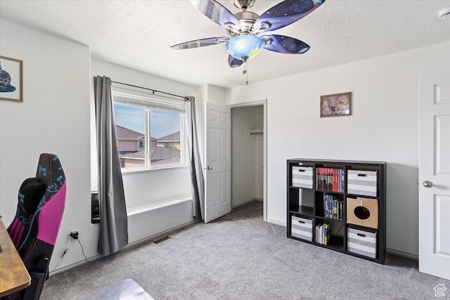 228 W 1975 N Unit 56, Harrisville, UT 84414 - office featuring carpet floors, ceiling fan, and a textured ceiling