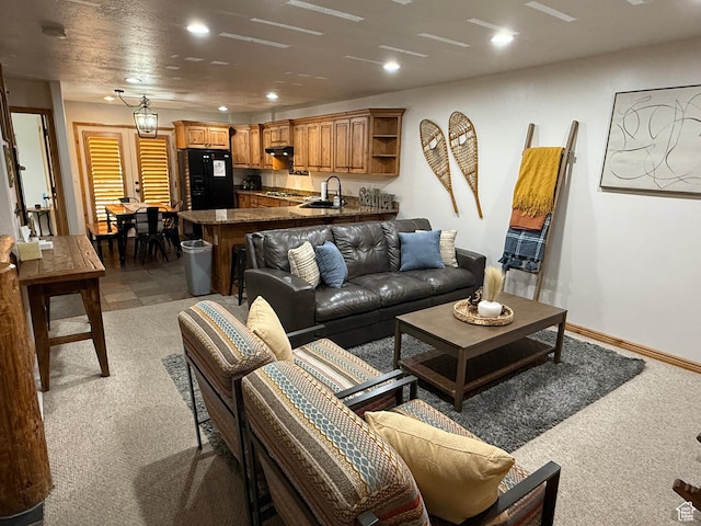 5060 E Lake View Dr N Unit 1108, Eden, UT 84310 - carpeted living room featuring a sink and recessed lighting