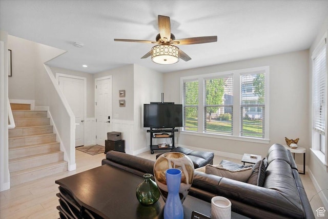 10848 S Tahoe Way S, Jordan, UT 84009 - living area featuring stairway and ceiling fan
