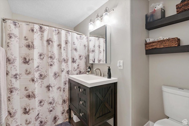 10848 S Tahoe Way S, Jordan, UT 84009 - bathroom featuring vanity and a textured ceiling