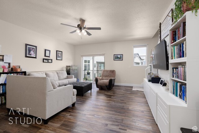 1619 N 1320 E, Payson, UT 84651 - living area featuring ceiling fan, dark wood-style floors, healthy amount of natural light, and a textured ceiling