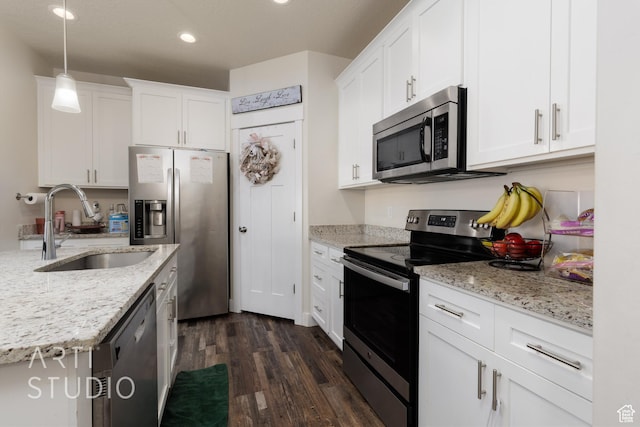 1619 N 1320 E, Payson, UT 84651 - kitchen featuring appliances with stainless steel finishes, recessed lighting, dark wood-style flooring, white cabinetry, and light stone countertops