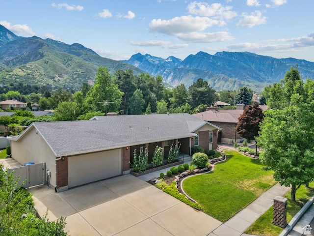 8711 S Rustler Rd, Cottonwood Heights, UT 84093 - view of front facade featuring brick siding, a garage, a gate, roof with shingles, and concrete driveway